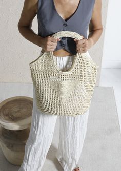 Handmade Raffia Crochet Bag, Natural Beach Tote, Raffia HandBag, Raffia Tote, Straw Beach Bag, Raffia Bag, Crochet Purse Bag, Natural Handbag, Raffia Tote Bag, Hand Knit Beach Bag Features: 30x50cm.  100% Eco-Friendly Paper Raffia Yarn Without Lining Dimensions, 3 colors are available 100% Eco-Friendly Raffia Yarn Brown Raffia Yarn Without Lining & Pocket **Fractions rounded up in inches Please ask for Fast Shipping Care: Do not come into contact with water as the material is natural paper threa Beach Woven Hobo Bag With Top Handle, Beach Woven Top Handle Hobo Bag, Woven Top Handle Hobo Bag For Beach, Handheld Hobo Bag For Summer In Natural Color, Natural Color Handheld Hobo Bag For Vacation, Handheld Beige Crochet Bag For Beach Season, Handheld Crochet Bag For Beach Season In Beige, Handheld Crochet Bag For Shopping In Beach Season, Handheld Woven Beach Bag In Beige