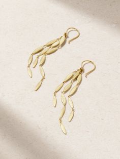 Sia Taylor’s jewelry collections are influenced by the designer’s studies at London's Royal College of Art. As the name suggests, these earrings are designed to look like a cascade of falling seeds, handcrafted from 18-karat gold. Contemporary Yellow Gold Evening Earrings, Evening Yellow Gold Sterling Silver Linear Earrings, Evening Yellow Gold Linear Earrings In Sterling Silver, Yellow Gold Sterling Silver Linear Earrings For Evening, Contemporary Sterling Silver Yellow Gold Earrings, Contemporary Sterling Silver Earrings In Yellow Gold, Contemporary Yellow Gold Sterling Silver Earrings, Contemporary Yellow Gold Drop Earrings, Contemporary Pierced Yellow Gold Earrings