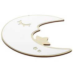 a white and gold crescent shaped broochle with stars on the moon, as if it were made from metal