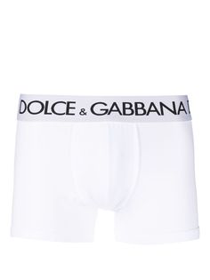 logo-waistband stretch boxers from DOLCE & GABBANA featuring chalk white, stretch-cotton, logo waistband, seam detailing, thigh-length and elasticated waistband. Stretch Boxer Briefs With Logo Waistband For Loungewear, Classic Stretch Bottoms With Ribbed Waistband, Classic Fitted Bottoms With Ribbed Waistband, Classic Cotton Boxer Briefs With Logo Waistband, Fitted Boxer Briefs With Logo Waistband, Fitted Short Boxer Briefs For Daywear, White Logo Print Bottoms For Summer, White Cotton Boxer Briefs With Elastic Waistband, Fitted Boxer Briefs With Elastic Waistband