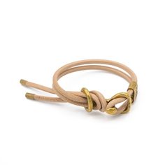 Hardware inspired by a vintage saddle bit, handmade with solid brass and our signature brass Giles &amp; Brother crimp.  Leather is calfskin from Italy, it is super s Gold Leather Bracelet With Brass Hardware, Brown Leather Bracelets With Brass Hardware, Adjustable Brown Leather Bracelet With Brass Hardware, Adjustable Gold Leather Bracelet With Brass Hardware, Adjustable Gold Bracelets With Brass Hardware, Vintage Leather Bracelet For Everyday, Gold Leather Bracelets For Everyday Use, Everyday Gold Leather Bracelets, Vintage Gold Leather Bracelet