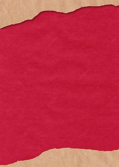 a piece of red paper with brown edges