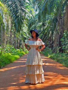 "Off Shoulder Ruffle Boho Dress for Women Beautiful and breathable 100% cotton fabric perfect for spring/summer. A very flattering dress can be worn in many ways. Sizing: Made in one size to fit S to XL / US: 4/6/8/10/12/14 Measurement; Chest up to 46\" Pit to pit laying flat 21\" across Top elastic 34-64\" around. Waist elastic 24-42\" Hip free Length Middle 55\" hem circumference 126\" **The design best fit a person who is 165 cm or more** (if you need alteration, please contact us) **Model si Beige Ruffled Maxi Dress For Wedding, Flowy Bohemian Gown, Floor-length Gown For Destination Wedding, Cream Bohemian Long Dress, Cream Long Bohemian Dress, Bohemian Long Cream Dress, Bohemian Cream Long Dress, Bohemian Maxi Wedding Dress, Bohemian Off-white Maxi Dress