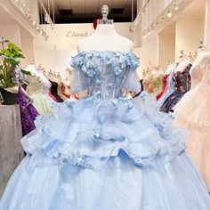 Cinderella Themed Wedding Dress, Ocean Blue Wedding Dress, Baby Blue Xv Dresses, Light Blue And Gold Quinceanera Dress, Floor-length Light Blue Gown For Quinceanera, Light Blue Floor-length Gown For Debutante Ball, Blue Floral Embroidered Dress For Banquet, Blue Floral Embroidery Dress For Banquet, Blue Spring Ball Gown For Debutante Ball