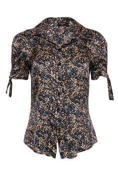 A black silk blouse by the brand Sonia Fortuna. Delicate orange florals punctuate this sweet top, accentuated by ties at the sleeve cuff. Wear it with cropped jeans, tucked into a cute mini, or paired underneath a blazer. Size 8 (IT 44) 98% Silk, 2% Spandex Slim fit Tie at sleeve hem Rounded hem Bust 36" Waist 29" Shoulder to hem 23" Sleeve length 9" Black Silk Blouse, Sweet Top, Sleeve Cuff, Floral Short, Black Silk, Designer Collection, Silk Blouse, Cropped Jeans, Dolce And Gabbana