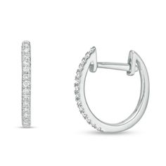 Top off any look in sparkling style with these diamond huggie hoop earrings. Created in cool 10K white gold, each on-trend hoop showcases a ribbon of shimmering diamonds that fits snuggly against the ear lobe. Captivating with 1/10 ct. t.w. of diamonds and a bright polished shine, these earrings secure with hinged backs. White Gold Earrings Zales, Huggie Hoop Earrings, Diamond Stone, Earring Backs, White Metal, Stone Settings, Designer Earrings, Diamond White, Fashion Earrings