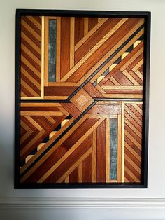 a wooden wall hanging in a room