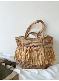 Large straw woven tote bag with fringes perfect for all occasions.Size approximately 47cm wide x 40cm tall. (18in x 16in) Designer Style ID: 8275 Large Straw Woven Tote Bag, Summer Bag, Everyday Shoulder Bag, Beach Bag Everyday Shoulder Bag, Tote Bag Summer, Handbags Large, Bag Summer, Woven Tote Bag, Summer Bag, Designer Style, Pocket Size, Beach Bag