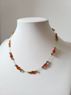 * This necklace is made from orange carnelian, oval-shaped purple pearl and nugget-shaped peridot. * The stones are tied together with a fine, refined stranded silk thread. * The necklace measures 45cm *It is mounted in 14k gold plated, stainless steel clasp. * Free delivery by post by registered letter * Necklace for women, fine minimalist. * Delivered in its reusable cotton protective pouch * Instagram _atelier768_ * Unique piece Orange Carnelian, Natural Stone Necklace, Natural Stones Necklace, Purple Pearl, Green Peridot, Purple Stones, Letter Necklace, Silk Thread, Charm Bracelets