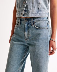 Embrace the nostalgia of the 90s with Abercrombie & Fitch's Women's Low Rise Baggy Jeans in Medium Tinted. Perfect for those who love a retro vibe, these jeans are a must-have for your casual wardrobe.

- Size: 30 SHORT
- Color: Medium Tinted
- Material: Pocket Bag - Polyester, Cotton Blend
- Gender: Female
- Fit: Low rise, 8.5” rise; relaxed at waist and hips; baggy, full-length leg
- Fabric: Vintage stretch for comfort and an authentic look

These jeans offer a versatile baggy fit that can be Classic Medium Wash Flare Jeans For Summer, Everyday Washed Cropped Rigid Denim Jeans, Everyday Washed Cropped Jeans In Rigid Denim, Spring Cutoff Cropped Rigid Denim Jeans, Spring Cutoff Cropped Jeans In Rigid Denim, Classic Flare Jeans With Frayed Hem For Everyday, Classic Washed Blue Bottoms For Everyday, Classic Washed Blue Everyday Bottoms, Casual Cutoff Flare Jeans For Everyday