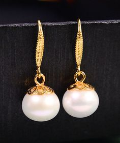 Women White 14K Gold Pearl Ball Drop EarringsMade of fine 14K Gold Pearl.Measurement: 3cm/1.17" * 1.2cm/0.468". Matches easily with daily hairstyle, dresses & Shirts Classic Yellow Gold Bridal Earrings With Elegant Design, Classic Bridal Earrings In 14k White Gold, Classic Rose Gold Clip-on Earrings, Classic 14k Gold White Bridal Earrings, Classic White 14k Gold Bridal Earrings, White Gold Drop Earrings For Formal Occasions, Gold-plated Yellow Gold Bridal Earrings For Formal Occasions, Elegant 14k Gold Pearl Earrings For Formal Occasions, 14k Gold Clip-on Earrings For Formal Events