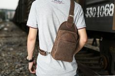 Men's Genuine Leather Sling Bag Leather Chest Bag With Anti-theft Pocket For Travel, Travel Leather Chest Bag With Anti-theft Pocket, Leather Travel Chest Bag With Anti-theft Pocket, Casual Soft Leather Bag For Everyday, Casual Soft Leather Bag For Everyday Carry, Casual Everyday Carry Bag In Soft Leather, Casual Leather Shoulder Bag With Anti-theft Pocket, Leather Bags With Anti-theft Pocket For On-the-go, Casual Soft Leather Saddle Bag