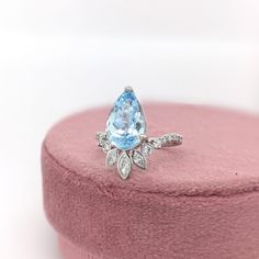 This beautiful ring features a 3.68 carat pear shaped Aquamarine gemstone with natural earth mined diamonds set in solid 14K gold. This Aquamarine ring makes a lovely March birthstone gift for your loved ones! This ring is made with solid 14K Gold and natural Earth mined SI / G-H diamonds. As listed, this ring is ready to ship. If you're interested in purchasing this setting with a different center stone please message us! Designer Silver Jewellery, Jewelry Showcases, Aquamarine Ring, March Birthstone, Birthstone Gifts, Aquamarine Rings, Aquamarine Gemstone, Natural Earth, Beautiful Ring