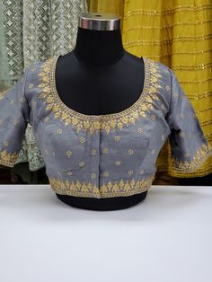 Fancy raw silk blouse with gold embroidery Blouse has 2 inch margins on each side to make it bigger Ready to ship Online only Elegant Art Silk Choli With Floral Embroidery, Designer Embroidered Brocade Choli, Long Sleeve Choli With Intricate Embroidery, Festive Designer Embroidered Top With Intricate Embroidery, Traditional Wear With Gold Embroidery In Chinon, Traditional Dola Silk Wear With Gold Embroidery For Festivals, Designer Embroidered Top For Festive Occasions, Bollywood Embroidered Top For Reception, Festive Raw Silk Fabric With Gold Embroidery