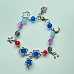 -An adjustable bracelet inspired by BTS' Jungkook's "Still With You". -The bracelet in the pic has 12 beads plus a blue one as charm, but you can take out some beads, if wanted, for the same price. Applicable for charms. -Try NOT to expose the bracelet to water, like wearing it to the beach or showering with it. -If you have any suggestions or questions, feel free to message me. I would be more than happy to help! Customized Trendy Charm Bracelet For Friendship, Trendy Metal Beaded Bracelets For Friendship, Trendy Metal Beaded Bracelets, Y2k Style Adjustable Silver Bracelets, Adjustable Silver Y2k Bracelets, Adjustable Silver Y2k Style Bracelets, Adjustable Blue Kpop Bracelets, Handmade Y2k Style Bracelets Gift, Handmade Adjustable Y2k Beaded Bracelets