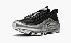 This Nike Air Max 97 offers a modified take on the Nike runner's original "Silver Bullet" Colorway with updated color blocking.  The upper sports black mesh with tonal overlays, while shiny metallic silver makes a statement towards the mudguard and sole.  Red branding hits the side panel, tongue, and heel tab.  As it’s done for over two decades, the Nike Air Max 97 hosts a foam sole with full-length Max Air cushioning. Red Branding, Nike Air Max 97 Black, Nike Runners, Silver Bullet, Stadium Goods, Nike Air Max 97, Black Mesh, Air Max Sneakers, Air Max