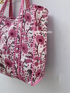 cotton print Bag The Indian Hand Block Printed Cotton Quilted Women's Handbags from Rajasthan India. This Handbag is completely Indian Printed on good quality cotton. Cotton quilted Jhola Bag made by Indian Artisans, this cotton quilted shopping bag is totally unique and multi purpose. Use this for your grocery or as a travel bag. Perfect to suit all. Item :- Cotton Handbag Material: Quilted Cotton Fabric Color - rainbow Pattern : Block Print Style: Tote Bag, Handle Bag, Shoulder Bag Size in Inch:- Height-18" inch Width- 19" inch Handle-13" inch Product Work: Printed & quilted Stitched Usage : Cosmetic, Make-up, Travel, Toiletries, Medicine, Accessories, Shopping and much more. Perfect for Beach Visits/ Quick Grocery runs/ Carrying Kids items/ Artist Paint book and Paints /Extra Bag Washab Eco-friendly Multicolor Cotton Beach Bag, Pink Cotton Beach Bag For Daily Use, Reversible Cotton Canvas Bag For Daily Use, Reversible Cotton Shoulder Bag For Everyday, Everyday Reversible Cotton Shoulder Bag, Multicolor Cotton Beach Bag For Everyday, Multicolor Cotton Everyday Beach Bag, Multicolor Cotton Beach Bag, Everyday Multicolor Cotton Beach Bag