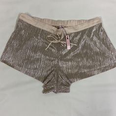 Nwt Victoria’s Secret Lingerie Bottoms Gold, Metallic, Pleated, Shorts With Drawstring Pajama Bottoms, Loungewear, Lingerie, Luxury, Glam, Disco Vibe, Pride Festival, Party, Clubbing, Dance Victoria’s Secret Very Sexy !!! New With Tags, Excellent Gift. Summer Pajama Shorts For Night Out, Victoria's Secret Summer Lounging Bottoms, Victoria's Secret Stretch Pajama Shorts, Victoria's Secret Stretch Bottoms For Party, Victoria's Secret Stretch Shorts For Summer, Victoria's Secret Stretch Pajama Shorts For Pajama Party, Victoria's Secret Summer Beach Shorts, Victoria's Secret Summer Party Bottoms, Beachwear Bottoms For Beach Party