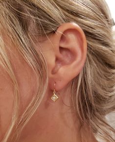 This is a beautiful diamond design earrings. It is set in real solid 14Kt Gold. You can choose if you want 14Kt White Gold, 14Kt Yellow Gold or 14Kt Rose Gold. This is the perfect gift for mom, wife, fiancee, girlfriend, valentine, daughter, family or friend. It is a special gift for mother's day, valentine's day, wedding, anniversary, birthday, Christmas, Easter, New Year's and any holiday. Setting Size: 7.65mm (0.300 inches) Length x 5.65mm (0.222 inches) Width x 3.65mm (0.142 inches) Height 0 Single Diamond Dangle Earring, Single Dangle Diamond Earring, Dainty Diamond Drop Earrings For Anniversary, Wedding Earrings With Diamond Accents And Diamond Shape, Diamond White Dangle Diamond Earrings With Single Cut, Diamond White Single Cut Dangle Earrings, Delicate Diamond White Earrings With Diamond Accents, Diamond-shaped Earrings With Diamond Accents For Gift, Gift Diamond-shaped Earrings With Diamond Accents