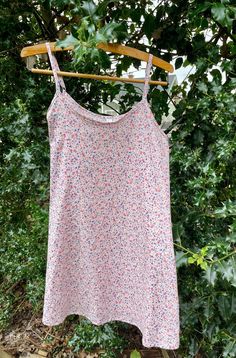 Comfy  slip dress/night gown to lounge around in.   Cotton lawn fabric is very soft and airy. A sweet and dainty floral print on a pink background.  Loose fitting with adjustable shoulder straps. Top of neckband to bottom of hem is 25 3/4 inches (65.4 cm) Size Small (38) - fits bust from 33.5" to 34.6" (85 cm to 88 cm) Material has been pre-washed.   Wash separately on a gentle cycle and hang to dry. Summer Sleeveless Nightgown With Adjustable Straps, Summer Sleeveless Sleepwear With Delicate Straps, Summer Sleepwear With Delicate Straps For Loungewear, Sleeveless Summer Nightgown With Adjustable Straps, Sleeveless Sleepwear With Delicate Straps For Summer, Spring Floral Print Nightgown For Pajama Party, Spring Sleepwear With Adjustable Spaghetti Straps, Summer Nightgown With Adjustable Spaghetti Straps, Feminine Sleeveless Slip Dress For Bedtime