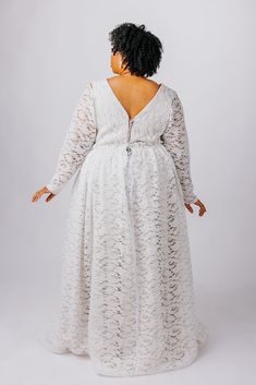 The Rue Gown is perfect for the boho bride. This gown features: V neckline and back made from soft boho-inspired lace, lined with matte satin with supportive boning Flowy, gathered skirt made from soft boho-inspired lace, lined with a matte satin a-line circle skirt Optional fitted sleeves or bishop sleeves with elastic cuffs, available as detachable or permanently attached sleeves Optional small train Center back zipper closure or optional corset back Customize this dress to make it yours by ch Lace Maxi Dress With Sweep Train For Wedding, Delicate Lace Maxi Length Gown, Bridesmaid Lace Gown With Lace Back, Fitted Lace Maxi Dress With Lace Back, Maxi Length Wedding Gown With Lace Back, V-neck Delicate Lace Maxi Dress For Wedding, Wedding Dress With Lace-up Back And Lace Material, Lace Bridesmaid Dress With V-neck, Floor-length Lace Wedding Dress With Lace Bodice