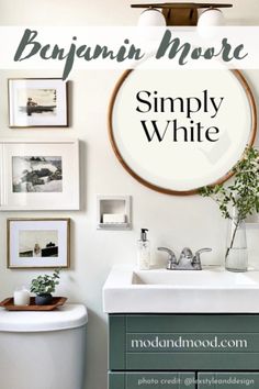 a bathroom with white walls and pictures on the wall above it that says, benjamin moore simply white