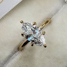 RING DETAILS METAL: available in Sterling Silver 925/10K/14k or 18k solid yellow gold, white gold, rose gold Engagement Ring ✦ Center stone: Simulated Diamond/Moissanite Diamond ✦ Center Stone Shape: Marquise Cut ✦ Size/Weight: 2.50 Carat/14*7 MM ✦ Stone Color: White ✦ Clarity: Excellent Please visit our store for more jewelry https://www.etsy.com/shop/FriendsJewelleryArt IMPORTANT INFORMATION ------Warranty Information------ We offer a 30 Days warranty for all of our jewelry. Please message me for more details. ------Every purchase includes a beautiful jewelry boxes.------- ------Working and Shipping time------    All Items are made to order for each customer. Please allow 2-3 weeks after purchase for shipping.� ------CUSTOM DESIGN AVAILABLE------- Please feel free to contact me with cust Marquise Solitaire, Wedding Ring For Women, Jewellery Marketing, Wedding Anniversary Rings, Hidden Halo, Ring Sizes, Cz Diamond, Rose Gold Engagement Ring, Marquise Cut