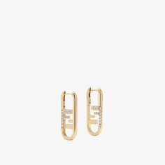 Oval earrings with Fendi O'Lock motif. Made of metal with a gold finish. Embellished with white crystals. Made in Italy. One Size Fendi Earrings, Fendi Logo Design, Fendi Store, Gold Color Ring, Womens Designer Bags, Wrist Jewelry, Lock Necklace, Oval Earrings, White Crystals