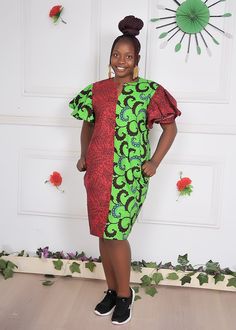 African Dress, Ankara Shift Dress, Casual Dress, Flared Short Sleeve African Print Dress, Knee length Dress With Pocket, Red Green This beautifully crafted classy, easy-to-wear ankara dress is made with 100% cotton African wax print floral fabric. it is suitable for both formal and informal occasions. Features: - 100% Handmade dress - Short sleeve - Pockets - Knee-length - Length of the dress on the model is 38inches Buyers can request customization if the measurement is different from the standard.  Production takes 3-5 business days and delivery takes 3-5 business days in most countries of the world. Standard Size Measurements are as follows: Size chart UK 4, US 0 Bust: 30 Waist: 22.5 Hip: 32.5 UK 6, US 2 Bust: 33 Waist: 25.5 Hip: 35 UK 8, US 4 Bust: 34 Waist: 26.5 Hip: 36 UK 10, US 6 Bu Traditional Knee-length Party Dresses, Traditional Red Maxi Dress With Short Sleeves, Red Knee-length Mini Dress, Red Fitted Dress With Short Sleeves, Traditional Mini Dress With Short Sleeves, Traditional Green Knee-length Dress, Traditional Red Midi-length Dress, Traditional Red Midi Length Dress, Ankara Shift Dress