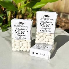 two boxes of white candy sitting on top of a table