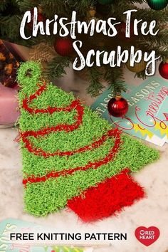 a christmas tree scrubby is sitting on the ground