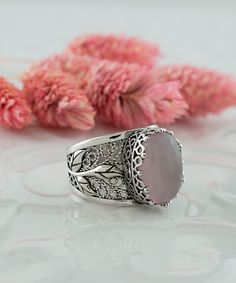 Rose Quartz Silver Boho Statement Ring, 925 Sterling Artisan Made Pink Quartz Jewelry, Handmade Leaf Detailed Filigree Floral Cocktail Ring Pink stone ring, oval statement ring, vintage ring, Anniversary gift, floral wedding ring, Boho jewelry, boho wedding gift Material: 925 Sterling Silver ( NICKEL FREE ) Gemstone: Rose Quartz 10x14 mm. FREE, FAST AND TRACKABLE SHIPPING FOR ALL EU COUNTRIES AND USA. -That ring is so stunning and dainty. Perfect for everyday wear. There is a gorgeous small Flower on the band of the ring and Quartz Gemstone that dainty. This red stone ring is made from our finest silver so they are durable for your everyday wear. COMES WİTH VELVET POUCH AND LUXURY GİFT BOX. Makes a great gift: Beautiful jewelry to give for every occasion. The perfect present  for mom , sis Vintage Rose Quartz Ring, Pink Quartz Jewelry, Banana Phone, Boho Wedding Gifts, Boho Statement Ring, Floral Wedding Ring, Pearl Rings Vintage, Pink Stone Rings, Floral Cocktails