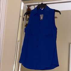 Express Royal Blue Sleeveless Top With Matching Royal Blue Buttons Chic Blue Tank Top For Work, Blue Tank Vest Blouse, Sleeveless Blue Blouse For Work, Casual Sleeveless Blue Blouse, Chic Blue Tank Vest, Blue Vest Top For Work, Blue Tank Vest For Spring, Blue Sleeveless Vest For Work, Blue Sleeveless Tank Top For Work