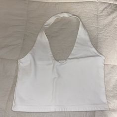 Brandy Melville White Halter Tank, Never Worn! Chic White V-neck Halter Top, White Fitted Basic Crop Top, Fitted Basic White Crop Top, White Casual Halter Neck Tank Top, White Stretch V-neck Halter Top, Casual White Halter Neck Tank Top, White Halter Neck Tank Top, White Fitted Halter Neck Crop Top, White Basic Tank Top For Day Out