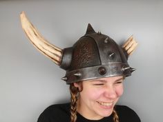 Step into the realm of fierce warriors with this extraordinary Viking helmet cosplay piece. Crafted to embody the spirit of the legendary Norse warriors, this helmet exudes strength, courage, and an undeniable aura of power. Meticulously designed and intricately detailed, this Viking helmet showcases the craftsmanship of ancient times. The helmet features a sturdy construction with authentic-looking rivets and engravings, capturing the essence of Viking aesthetics. Its imposing horned design, th Warrior Style Masks And Prosthetics For Larp And Halloween, Viking Style Cosplay Costume For Events, Viking Cosplay Costume For Fantasy Events, Viking Costume Accessories For Larp And Halloween, Viking Larp Costume Accessories For Halloween, Warrior Costume Accessories For Larp And Halloween, Warrior Style Costume Accessories For Larp Halloween, Adjustable Medieval Costume Accessories For Cosplay, Warrior Cosplay Costume For Halloween