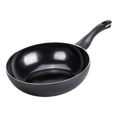 an empty frying pan on a white background