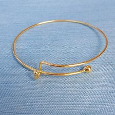 "This is gold toned single bar adjustable bangle bracelet. Material: Zinc Alloy Color: Gold Toned Measurement: 21 cm(8 2/8\") long You get 1 bracelet For bulk amounts request a custom order by clicking on the \"Request Custom Order\" button. Bulk amounts may sometimes take more days to ship out. Items ship within 1 business day" Adjustable Minimalist Yellow Gold Charm Bracelet, Minimalist Adjustable Yellow Gold Charm Bracelet, Minimalist Hypoallergenic Adjustable Gold Bracelet, Adjustable Minimalist Gold Bracelet With Extender, Minimalist Adjustable Gold Bracelet With Extender, Gold Metal Jewelry With Sliding Knot, Adjustable Yellow Gold Round Cuff Bracelet, Modern Adjustable Charm Bracelet With Extender, Adjustable Bangle Charm Bracelet With Extender