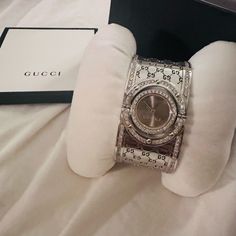 Limited Edition! Rare New Ladies Gucci Wide Twirl 2.60ct.Aprx. Custome Set Real Diamond Watch Ya112401 Limited Edition With Diamonds All On Band And Dual Dials. Hard To Find. New Never Been Worn. New Ladies Gucci Wide Twirl 2.60ct.Aprx. Custome Set Real Diamond Watch Ya112401 You Are Watching A New Ladies Gucci Wide Twirl 2.60ct.Aprx. Custome Set Real Diamond Watch Ya112401 *Product Information* Brand Name:Gucci Model Number:Ya112401 Part Number:Ya112401 Item Shape: Round Dial Window Material Ty Gucci Diamond Watch With Diamond Hour Markers, Luxury Gucci Diamond Watch, Elegant Gucci Diamond Watch In White Gold, Gucci White Gold Elegant Diamond Watch, Elegant Gucci White Gold Diamond Watch, Gucci Jewelry With Diamond Accents For Gift, Gucci Classic Diamond Watch With Diamond Hour Markers, Timeless Silver Gucci Diamond Watch, Gucci Silver Diamond Watch