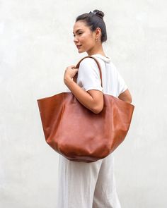 Milan Leather Tote - Cognac – Liberté Leather Brown Smooth Grain Hobo Bag For On-the-go, Vegetable-tanned Brown Shoulder Bag For Everyday, Everyday Brown Vegetable-tanned Shoulder Bag, Brown Large Capacity Shoulder Bag In Vegetable Tanned Leather, Brown Large Capacity Vegetable Tanned Leather Shoulder Bag, Daily Use Cognac Hobo Bag With Smooth Grain, Large Brown Casual Shoulder Bag, Brown Double Handle Hobo Bag With Smooth Grain, Large Capacity Brown Vegetable Tanned Leather Shoulder Bag