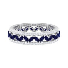 a white gold ring with blue sapphire and diamonds