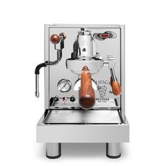 an espresso machine with wooden handles and gauges on the front, sitting on a white background