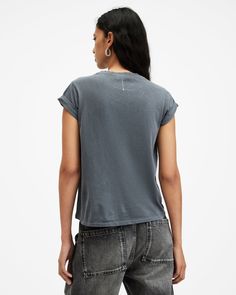 An easy piece, this is the Anna T-Shirt. Crafted from soft organic cotton, it's shaped to a slim silhouette. Featuring turned-up cuffs and our AllSaints signature on the back of the neck. We keep this staple on rotation all year round - make it part of your collection.   This t-shirt is designed to a slim fit Pullover Crew neck Short sleeve Turned up cuffs AllSaints signature logo Everyday Washed Top With Shirttail Hem, Everyday Washed Tops With Shirttail Hem, Washed Tops With Shirttail Hem For Everyday, Basic Washed Organic Cotton Tops, Cotton Washed Tops With Shirttail Hem, Cotton Tops With Shirttail Hem And Washed Detail, Washed Cotton Tops With Shirttail Hem, Everyday Crew Neck Tops With Rolled Sleeves, Crew Neck Organic Cotton Washed Tops