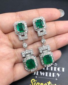 "IN STOCK! Ready for shipping! Free Worldwide ENJOY OUR WORRY-FREE SERVICE AND THE DAZZLING, GENUINE JEWELRY WE DESIGN AND HANDCRAFT WITH LOVE❤️ OMG, when our goldsmiths first showed me this pair of Huge and extremely gorgeous VIVID GREEN emerald earrings, I almost fainted as the sparkle and the beauty of this Ultra VIVID & Transparent ZAMBIAN Emeralds are so stunning, especially when surrounded by 98 pieces of top-graded, sparkling, clean & white diamonds (two of which are large 35 poin Art Deco White Gold Earrings For Gift, Luxury Gia Certified Dangle Jewelry, Aaa Quality Dangle Jewelry For Gifts, Aaa Quality Emerald Jewelry For Formal Occasions, Gia Certified Art Deco Jewelry For Gift, Gia Certified Art Deco Jewelry As Gift, Gia Certified Art Deco Jewelry Gift, Gia Certified Silver Dangle Earrings, Art Deco Gemstone Earrings For Gift