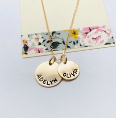 "Kids Names Necklace, Gold Disc Mom Necklace Please make sure you don't forget to put the information for personalization in the note to seller box at check out :) This is a hand stamped 14k Gold Filled necklace. This necklace comes with a 1/2 14k gold filled disc and a larger 5/8\" 14k gold filled disc. Chain is a 16, 18 or 20\" 14k gold filled cable chain. Please provide the following at checkout in message to seller box: - 1/2\" disc ( up to 9 characters) - 5/8\" disc ( up to 14 characters) E Gold Round Disc Charm Necklace 14k Gold Filled, Gold Round Disc Charm Necklace In 14k Gold Filled, Gold Round Disc Charm Necklace, Gold Adjustable Round Disc Charm Necklaces, Gold Hand Stamped Round Disc Charm Necklace, Gold Hand Stamped Charm Necklaces, Gold Charm Necklace Gift For Mom, Gold Hand Stamped Round Charm Necklaces, Gold Hand Stamped Necklace For Mom