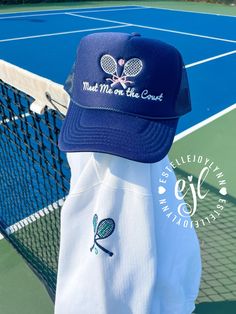 Tennis Embroidered Trucker Hat / Meet Me on the Court / Tennis Player Hat / Snap Back Adjustable Tennis Navy Blue Trucker Hat Hat comes as show in photo in Navy/White Back of hat has snapback adjustment **Colors/shades of hats may vary depending on availability** Designed and Curated by EstelleJoyLynn All Hats © Copyright EstelleJoyLynn, LLC tennis, tennis hat, embroidery, embroidered, trucker hat, hat, ball cap, sports, feminine, adjustable, embroider Tennis Hat, Team Word, Blue Trucker Hat, Normandy Beach, Embroidered Bracelet, Colors Shades, Beach Bachelorette, Hat Embroidery, Tennis Player