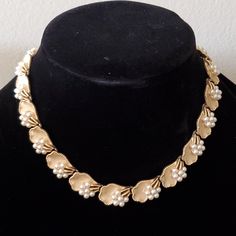 Trifari Brand Have Been Sought After By Jewelry Enthusiasts And Collectors Alike. This Is A Rare Trifari Elegant Vintage Necklace. Gold-Tone Patented Trifanium Leaf Links With Faux Pearl Clusters. Circa 1950's Trifari Jewelry, Pearl Cluster, Necklace Gold, Vintage 1950s, Vintage Necklace, Faux Pearl, Womens Jewelry Necklace, Gold Tones, Gold Necklace