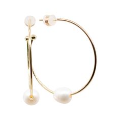 Staples of class and sophistication, our Alley round hoop earrings are beautiful in every light. Decked with a white freshwater pearl that complements your every look, you'll be gleaming like the sun all day long. Each piece of jewelry created by The Freshwater Pearl Company features genuine freshwater cultured pearls. Our collections are proudly designed in Palm Springs and distributed in the U.S. from our San Diego studio for a touch of California coastal style. Pearl Type Freshwater Pearl Siz Everyday Pearl Hoop Jewelry, Modern Pearl Hoop Jewelry, Modern Hoop Pearl Jewelry, Small Hoop Pearl Earrings, Classic Pearl Hoop Jewelry, Modern Hoop Jewelry With Pearl Charm, Modern White Pearl Hoop Earrings, Modern Pearl Hoop Earrings For Wedding, White Pearl Drop Hoop Earrings