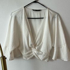 Silky Blouse, Fitted Through Waist With A Side Zip Closure. Never Worn. Chic White V-neck Crop Top, Chic White Short Sleeve Crop Top, Chic Short Sleeve Crop Top For Brunch, White Cropped Chic Top, Chic White V-neck Blouse, Feminine Cropped Blouse For Brunch, Chic White Crop Top For Spring, White V-neck Top For Brunch, Elegant Crop Top For Brunch