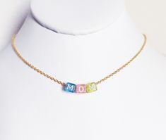 Unique initial colorful letter necklace for a great meaningful gift: Introducing our dainty custom letter necklace, featuring a delicate colorful blue, pink, yellow, orange, green acrylic letter square charms. Crafted with a gold plated or silver chain, this charming necklace is also available in in different sizes. It's the ultimate initial gift for your girlfriend or best friend and makes a thoughtful present for birthdays, sweet 16s, baby showers, anniversaries, or any special occasion. Choos 14k Gold Initial Necklace, Initial Necklace Silver, Sideways Initial Necklace, Dainty Initial Necklace, Name Necklace Gold, Necklace Packaging, Gold Letter Necklace, Initial Gifts, Acrylic Letters