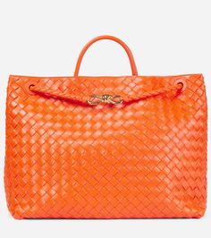 Bottega Veneta Andiamo large intrecciato leather tote bag (Mytheresa). Material: lamb leather. Colour: Orange. Get ready for the fall / Halloween season with this stylish orange tote bag. #fashion #bag #purse #bagsandpurses #outfits #luxury #bottegaveneta Bottega Andiamo, Andiamo Bag, Bottega Veneta Bag Tote, Bottega Veneta Andiamo, Designer Perfumes, Orange Tote Bags, Bag Outfit, Orange Bag, Leather Tote Bag